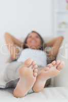 Woman relaxing with her feet up