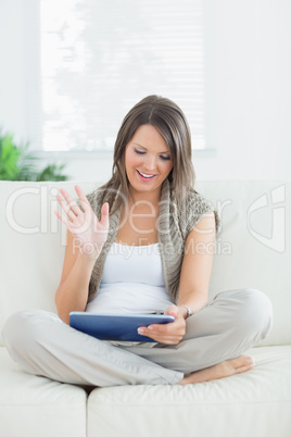 Woman using video chat on tablet pc