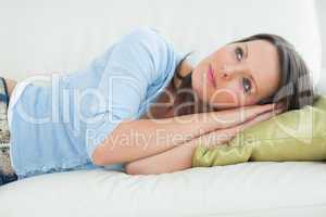 Resting woman lying on the sofa
