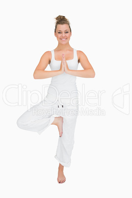 Woman in standing yoga pose
