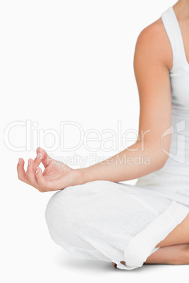 Woman doing yoga while sitting