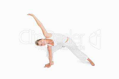 Girl in extended triangle yoga pose