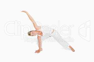 Girl in extended triangle yoga pose