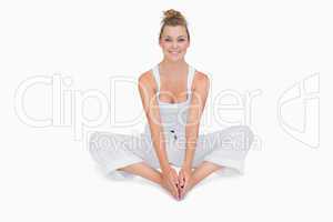 Girl sitting in bound angle yoga pose