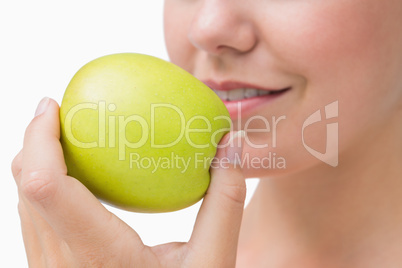 Woman about to eat apple