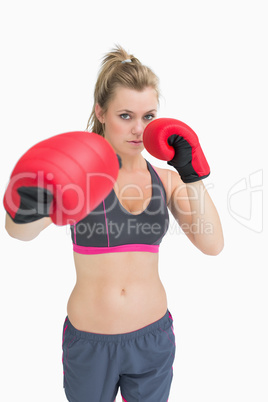 Woman standing in boxing gear
