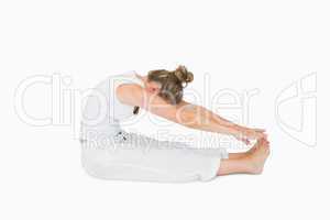 Woman sitting stretching