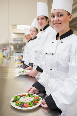 Chef's presenting their salads