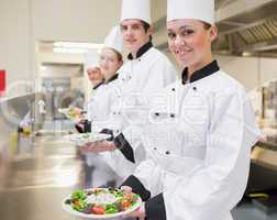 Happy Chef's showing their salads