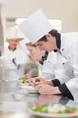 Culinary class preparing salads