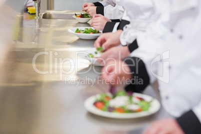 Chef's preparing salads