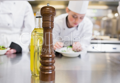 Olive oil and pepper grinder