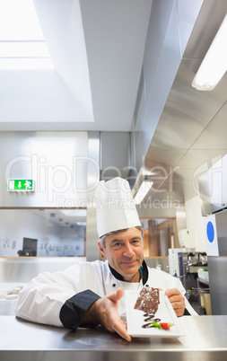 Chef presenting a desert