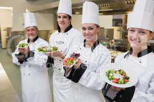 Happy Chef's presenting their salads