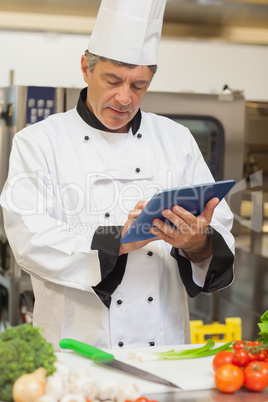 Chef using digital tablet