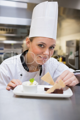 Happy chef finishing desert