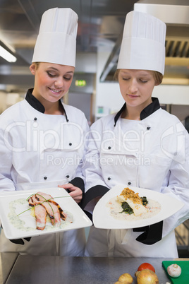 Two Chef's admiring their work