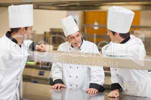 Three Chef's discussing