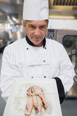 Chef presenting his dish