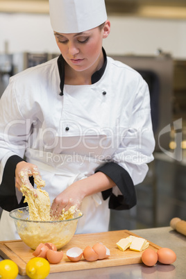 Baker preparing dough