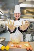 Baker showing her sticky hands