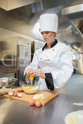 Baker preparing dough