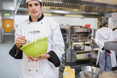 Chef mixing in the kitchen