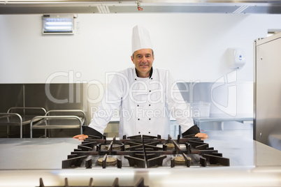 Chef standing at grill