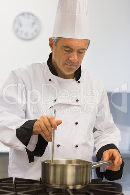 Chef cooking sauce
