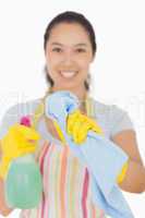 Woman cleaning window