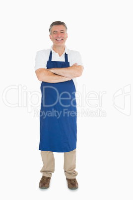 Laughing man dressed in apron