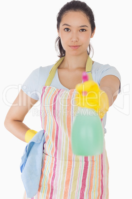 Woman spraying cleaner