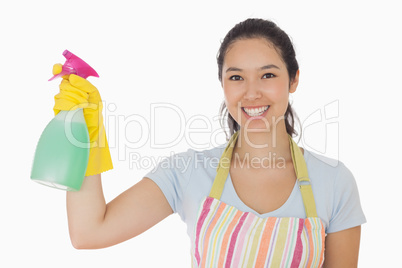 Young woman holding a window cleaner
