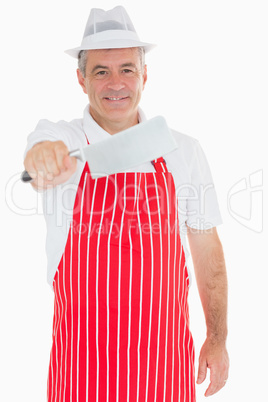 Butcher holding big meat cleaver