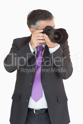 Businessman taking a picture