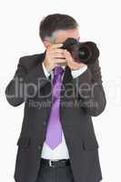 Businessman taking a picture