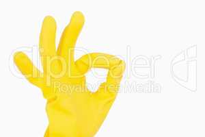 Hand in glove showing ok symbol