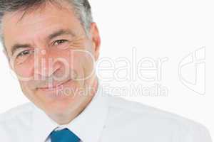 Smiling grey haired businessman