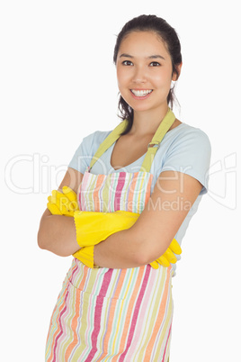 Smiling woman with crossed arms