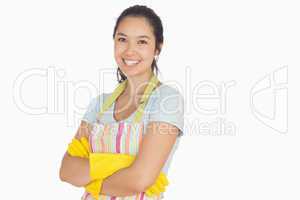 Smiling young woman with crossed arms