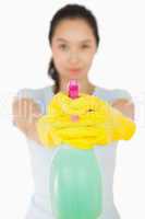 Woman pointing spray bottle
