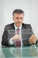 Man writing on a virtual screen