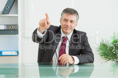 Businessman pointing at something