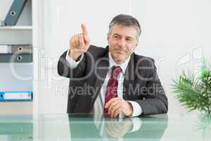 Businessman pointing at something