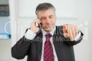 Businessman working on the phone