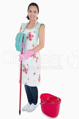 Woman with mop and bucket