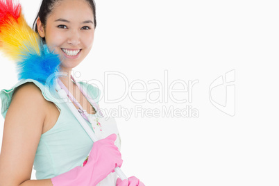 Happy woman with duster