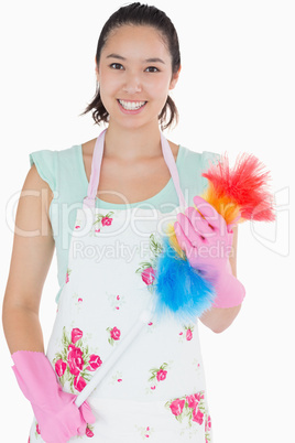 Woman holding a duster