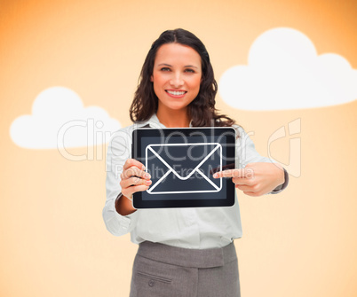 Woman standing holding a tablet pc with a message symbol