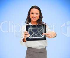 Businesswoman smiling and pointing to mail symbol